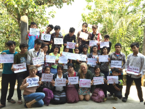 Maung Nyein with his fellow students and volunteers on International Women’s day 
